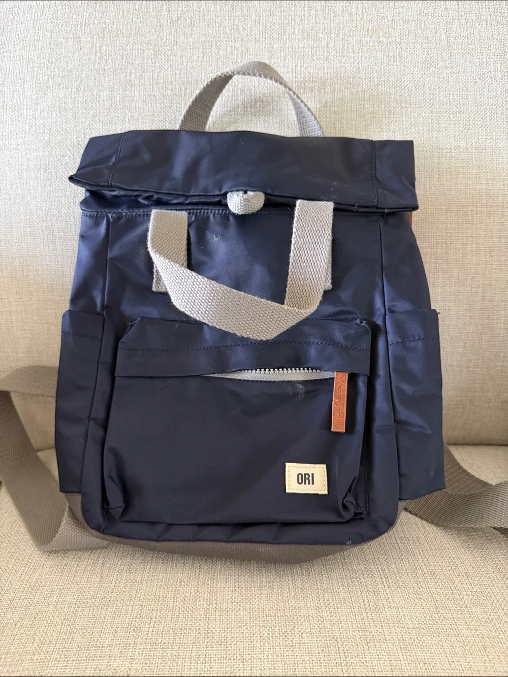 Navy Roll-Top Backpack with Beige Straps
